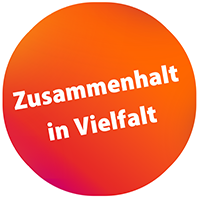 Button mit der Aufschrift „Zusammenhalt-in-Vielfalt”